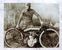 This early American daredevil poses with his custom "bent tank" 1911 Flying Merkel board track racer.